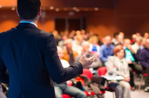 Speaker at Business Conference and Presentation. Speaker at Business Conference and Presentation. Audience at the conference hall.